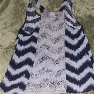 Blue and white tank top, design on back